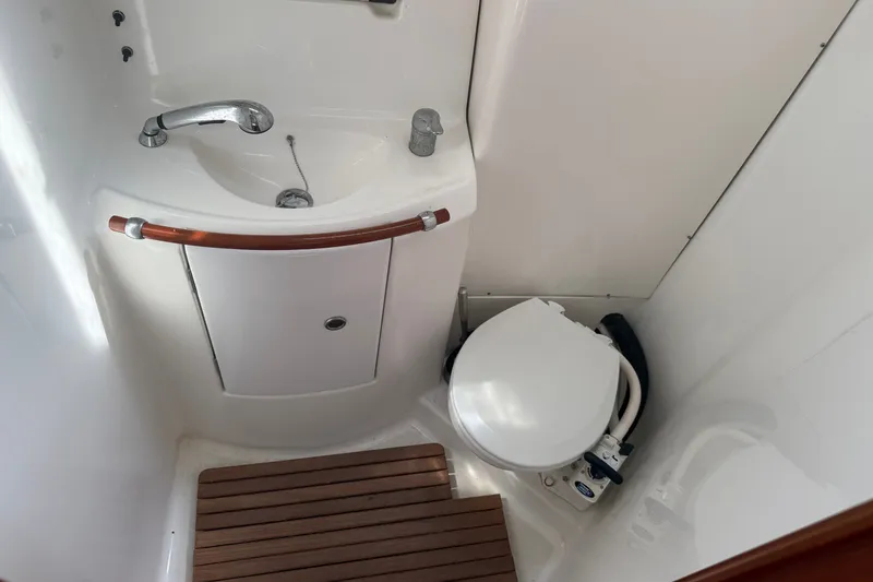Slide: The Image of Bathroom interior of 2003 Beneteau Oceanis Clipper 393 yacht with sink and toilet. - 22