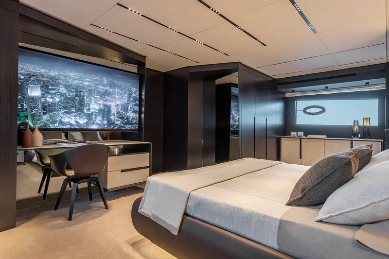 Slide: The Image of Luxurious interior of 2026 Pershing GTX116 yacht with modern bedroom and cityscape view. - 25