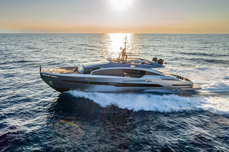 Slide: The Image of Luxury Pershing GTX116 yacht cruising at sunset, 2026 model, on open sea. - 4