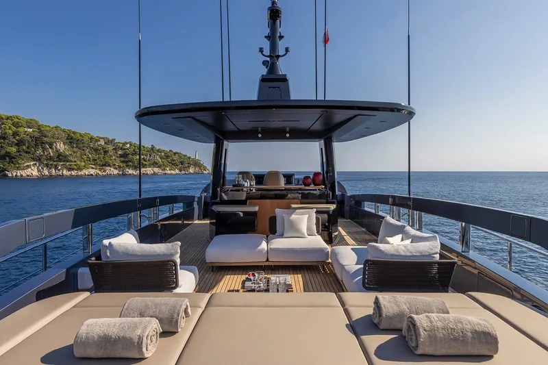 Slide: The Image of Luxurious 2026 Pershing GTX116 yacht deck with plush seating and ocean view. - 8
