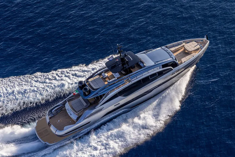 Slide: The Image of Aerial view of 2026 Pershing GTX116 yacht cruising on open sea. - 2
