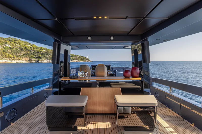 Slide: The Image of Luxurious 2026 Pershing GTX116 yacht interior with ocean view and elegant seating area. - 10