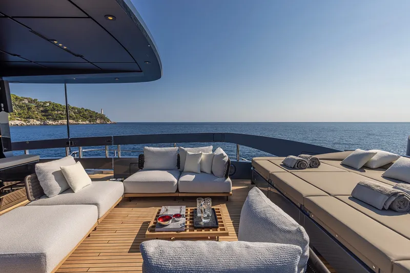 Slide: The Image of Luxurious deck of 2026 Pershing GTX116 yacht with ocean view and elegant seating. - 11