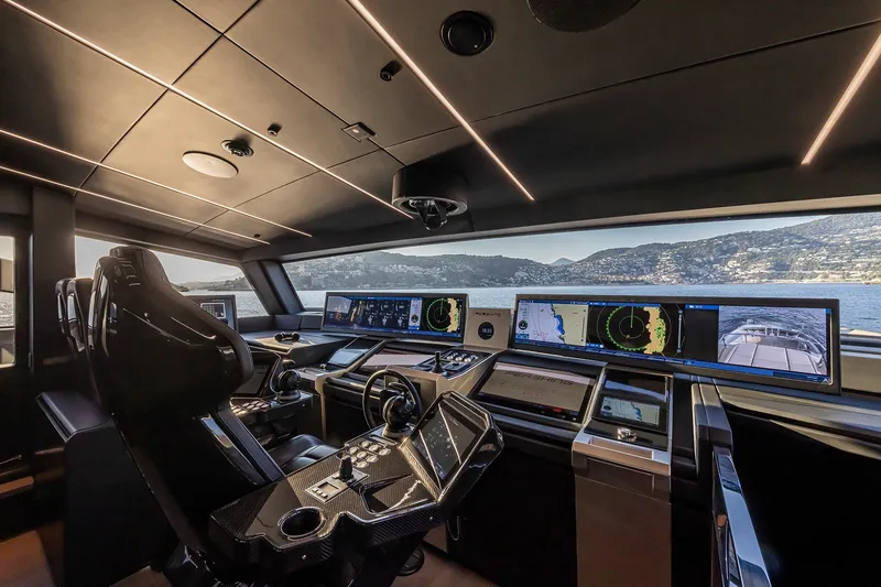 Slide: The Image of Futuristic 2026 Pershing GTX116 yacht cockpit with advanced navigation displays and luxurious design. - 17