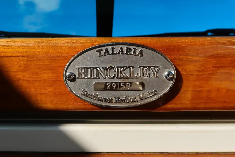 Slide: The Image of Hinckley Talaria 29R 2008 nameplate on wooden surface, Southwest Harbor, Maine. - 29