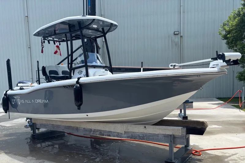 Slide: The Image of 2025 Tidewater 210 LXF boat on display, featuring sleek design and modern equipment. - 3