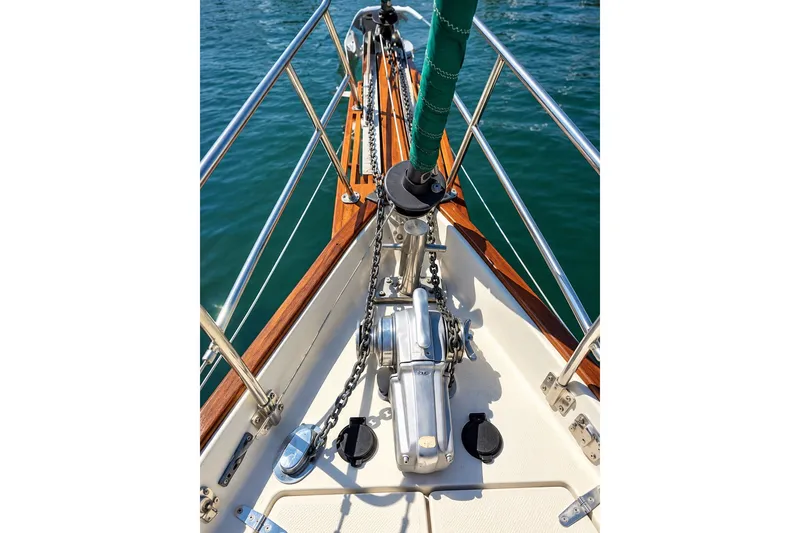 Slide: The Image of Bow of 1988 Gozzard Cutter 36 sailboat with anchor chain and winch. - 8