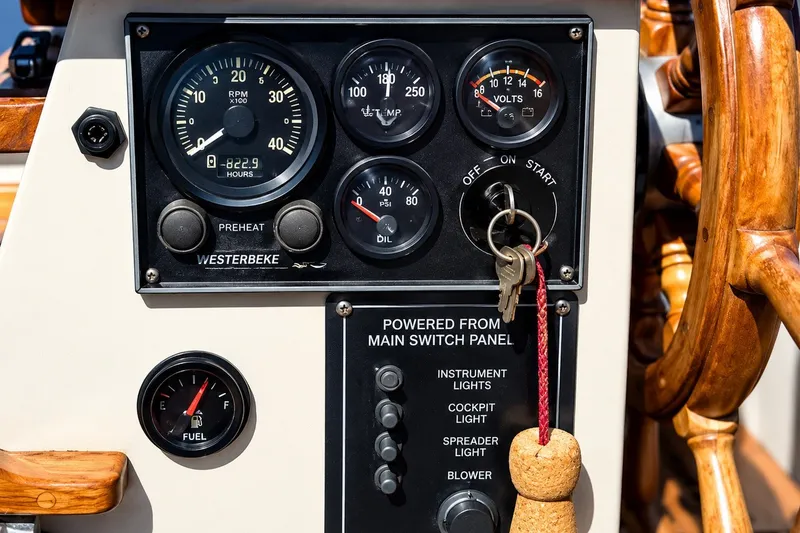 Slide: The Image of Control panel of a 1988 Gozzard Cutter 36 sailboat with gauges and ignition keys. - 10