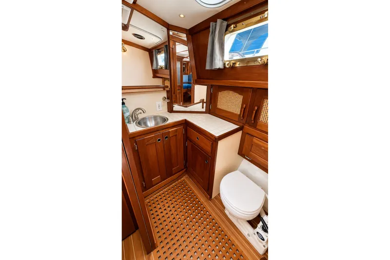 Slide: The Image of Elegant wooden interior of 1988 Gozzard Cutter 36 yacht bathroom. - 25