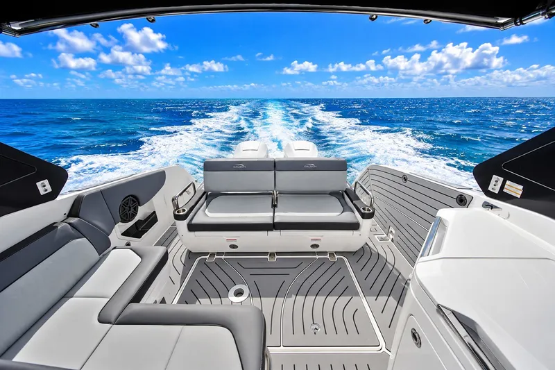 Slide: The Image of 2023 Galeon 325 GTO boat interior with ocean view and seating area. - 3
