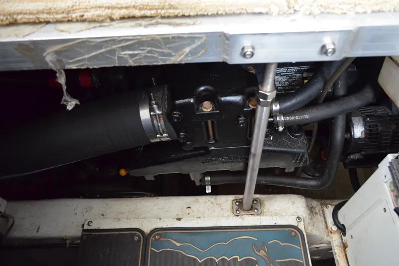 Slide: The Image of Engine compartment of a 2000 Carver 356 Aft Cabin Motor Yacht, showing mechanical components. - 55