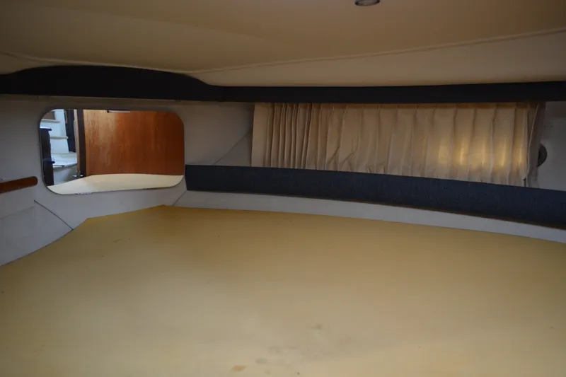 Slide: The Image of Interior cabin of 2000 Carver 356 Aft Cabin Motor Yacht with window and curtains. - 43