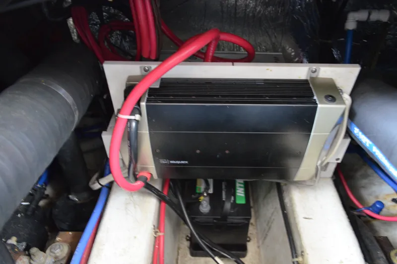 Slide: The Image of Engine compartment of a 2000 Carver 356 Aft Cabin Motor Yacht with wiring and components. - 56