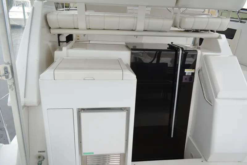 Slide: The Image of Interior view of 2000 Carver 356 Aft Cabin Motor Yacht with seating and storage. - 13