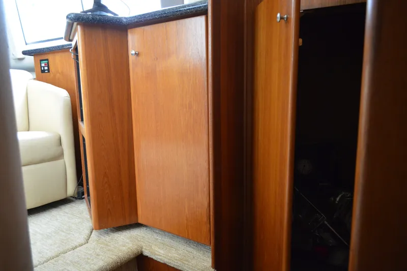 Slide: The Image of Interior view of 2000 Carver 356 Aft Cabin Motor Yacht with wooden cabinetry. - 47