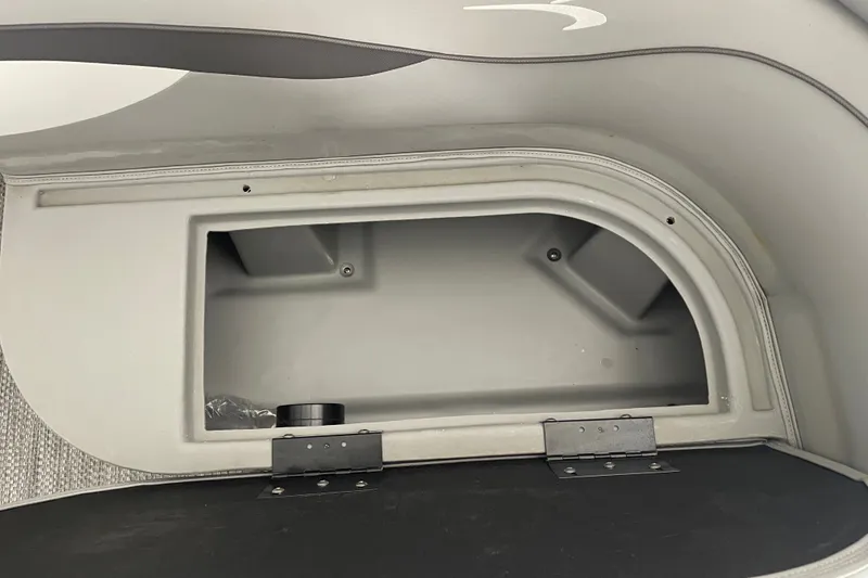 Slide: The Image of Storage compartment in 2023 Bennington 20 SS boat, featuring sleek interior design. - 21