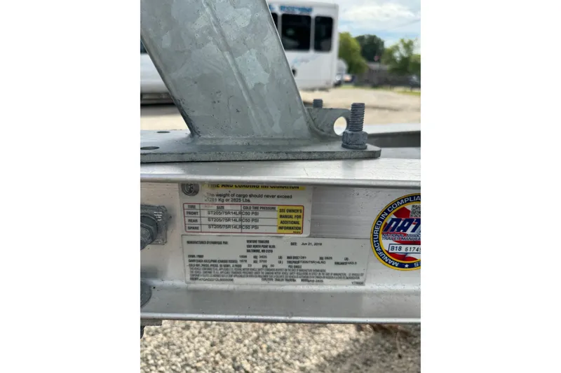 Slide: The Image of Trailer label with tire specifications for 2020 Tidewater 198 CC Adventure boat. - 16