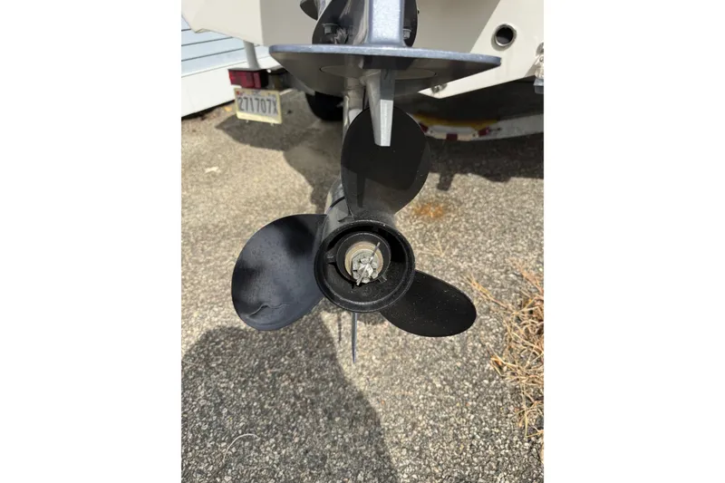 Slide: The Image of 2020 Tidewater 198 CC Adventure boat propeller on asphalt surface. - 15