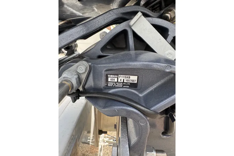 Slide: The Image of Close-up of Yamaha F115XB engine part on 2020 Tidewater 198 CC Adventure boat. - 13