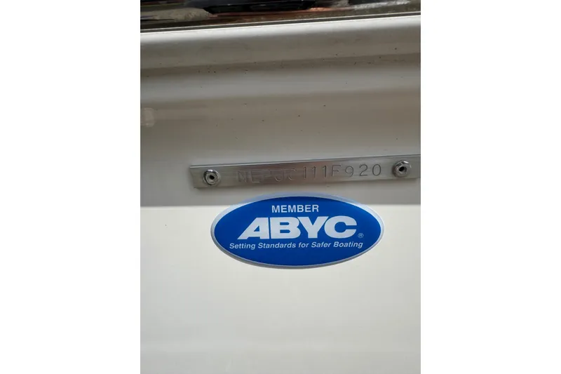 Slide: The Image of 2020 Tidewater 198 CC Adventure boat with ABYC membership sticker. - 12