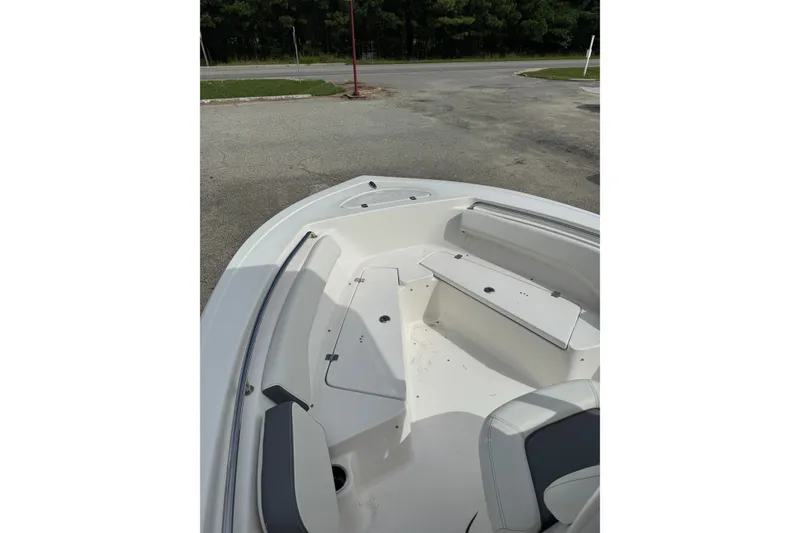 Slide: The Image of 2020 Tidewater 198 CC Adventure boat interior with seating and storage compartments. - 1