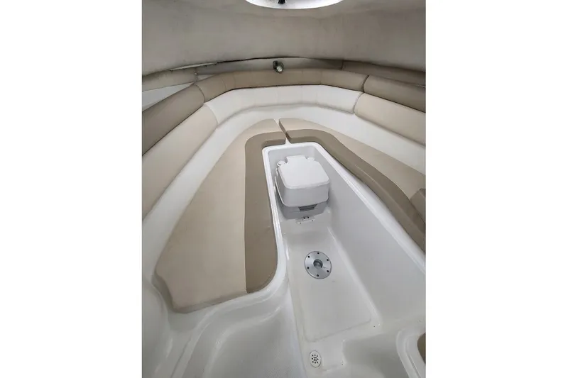 Slide: The Image of Interior cabin of 2012 Sea Fox 216 Walk Around boat with beige seating. - 19