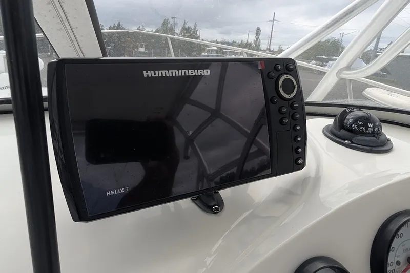 Slide: The Image of Humminbird Helix 7 fishfinder on 2012 Sea Fox 216 Walk Around boat dashboard. - 11