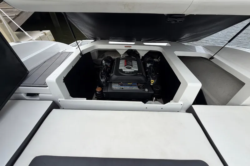 Slide: The Image of Open engine compartment of a 2019 Monterey M-22 boat, showcasing the engine details. - 35