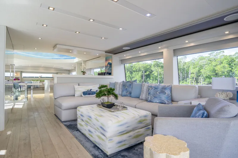 Slide: The Image of Luxurious interior of 2018 Hatteras M75 Panacera yacht with modern decor and large windows. - 31