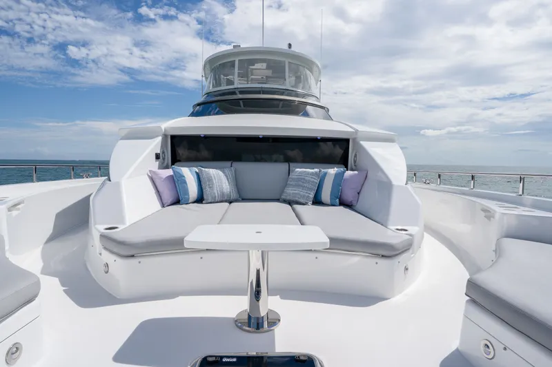 Slide: The Image of Luxurious 2018 Hatteras M75 Panacera yacht deck with plush seating and ocean view. - 22