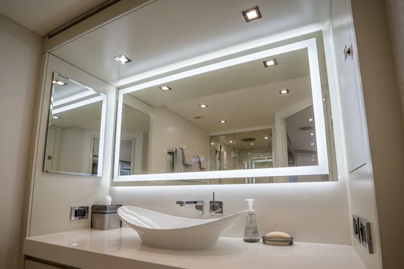Slide: The Image of Luxurious bathroom interior of 2018 Hatteras M75 Panacera yacht with modern fixtures. - 45