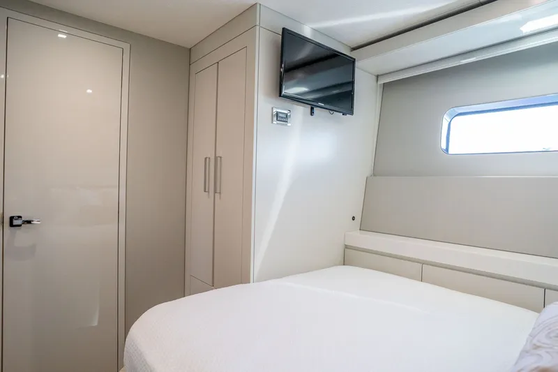 Slide: The Image of Luxurious cabin interior of 2018 Hatteras M75 Panacera yacht with modern design and TV. - 51