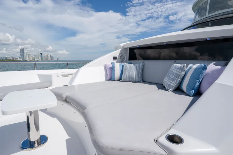 Slide: The Image of Luxurious 2018 Hatteras M75 Panacera yacht deck with plush seating and ocean view. - 23