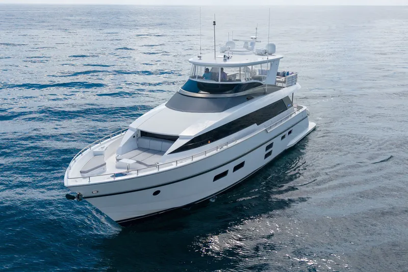 Slide: The Image of 2018 Hatteras M75 Panacera yacht cruising on open water. - 3
