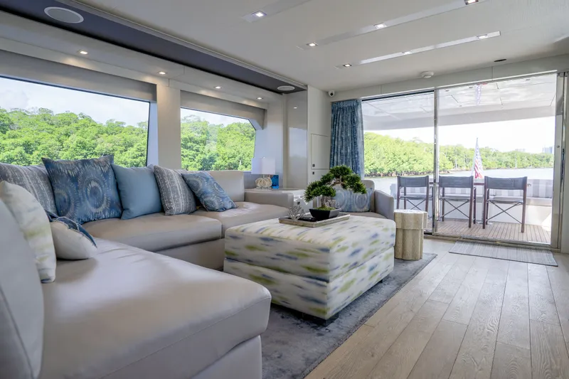 Slide: The Image of Luxurious interior of 2018 Hatteras M75 Panacera yacht with elegant seating and scenic views. - 30