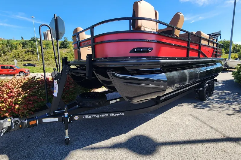 Slide: The Image of 2027 Ranger Pontoon 223FC in vibrant red on a trailer, parked outdoors. - 8