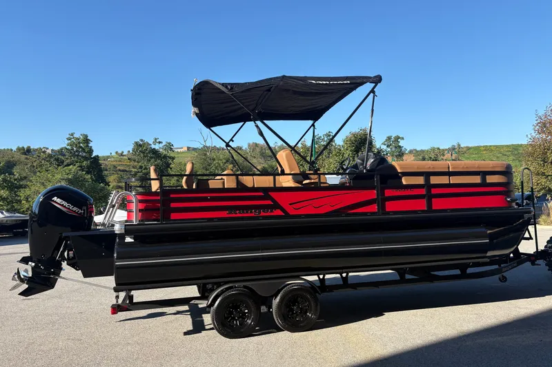 The Image of 2027 Ranger Pontoon 223FC with Mercury engine on trailer, parked outdoors. - 0