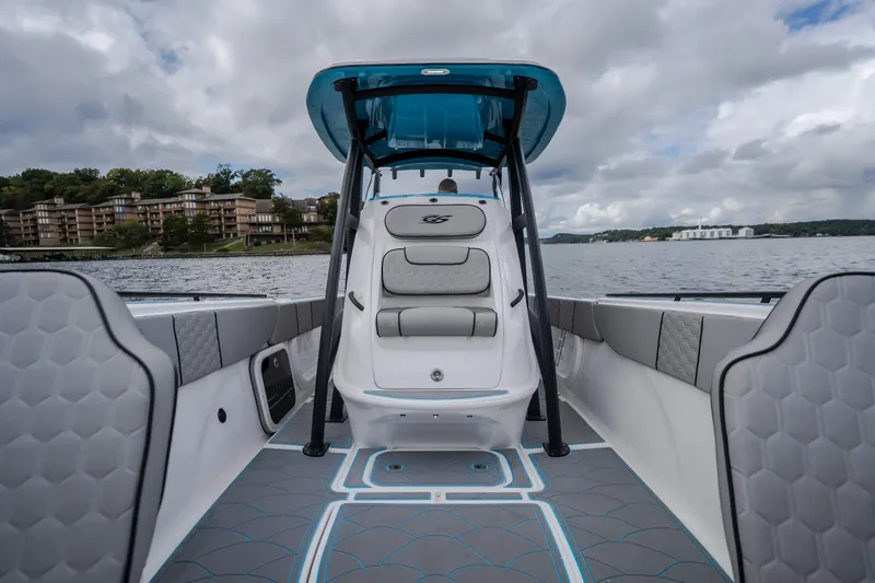 Slide: The Image of 2024 Glasstream 32 GSX boat interior with modern seating and scenic lake view. - 45