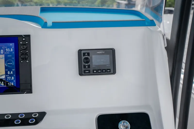 Slide: The Image of Dashboard of 2024 Glasstream 32 GSX boat with navigation and control panels. - 52