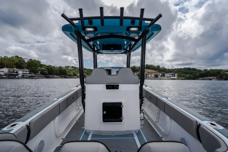 Slide: The Image of 2024 Glasstream 32 GSX boat interior with lake view, featuring modern design and seating. - 10
