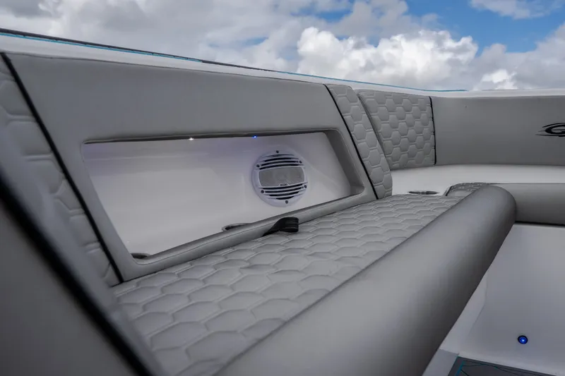 Slide: The Image of 2024 Glasstream 32 GSX interior with quilted seating and integrated speaker system. - 38