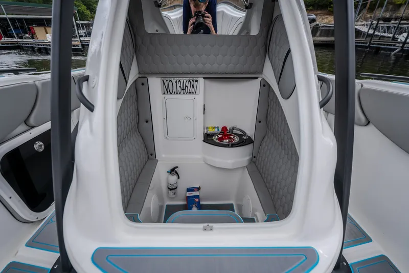 Slide: The Image of 2024 Glasstream 32 GSX boat interior with seating, storage, and safety equipment. - 31