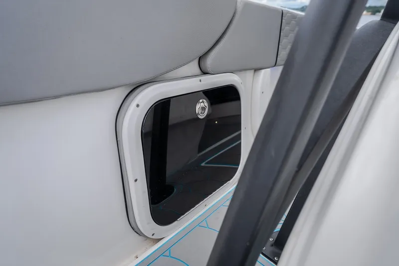 Slide: The Image of 2024 Glasstream 32 GSX boat interior storage compartment with sleek design. - 25
