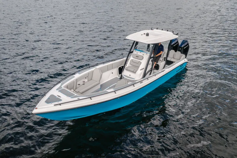 Slide: The Image of 2024 Glasstream 32 GSX boat on open water, featuring sleek design and modern amenities. - 4