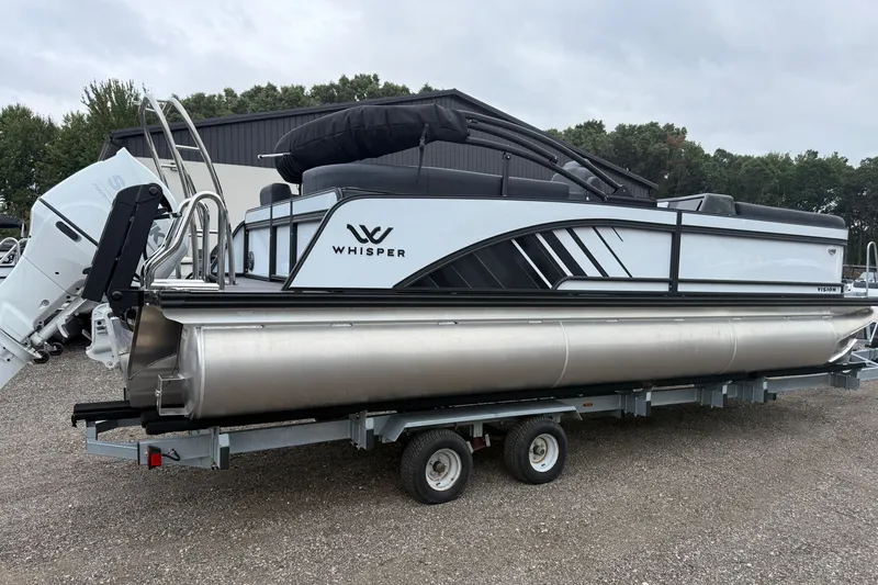 Slide: The Image of 2027 Whisper VISION RLS 23V pontoon boat on trailer, sleek design, outdoor setting. - 3