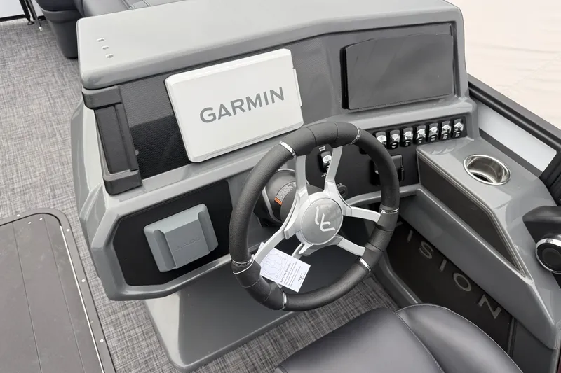 Slide: The Image of Steering console of 2027 Whisper VISION RLS 23V with Garmin navigation system. - 18