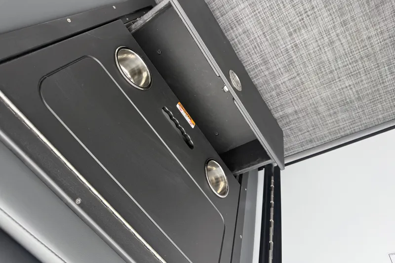 Slide: The Image of Interior view of Whisper VISION RLS 23V 2027, featuring sleek storage compartments. - 11