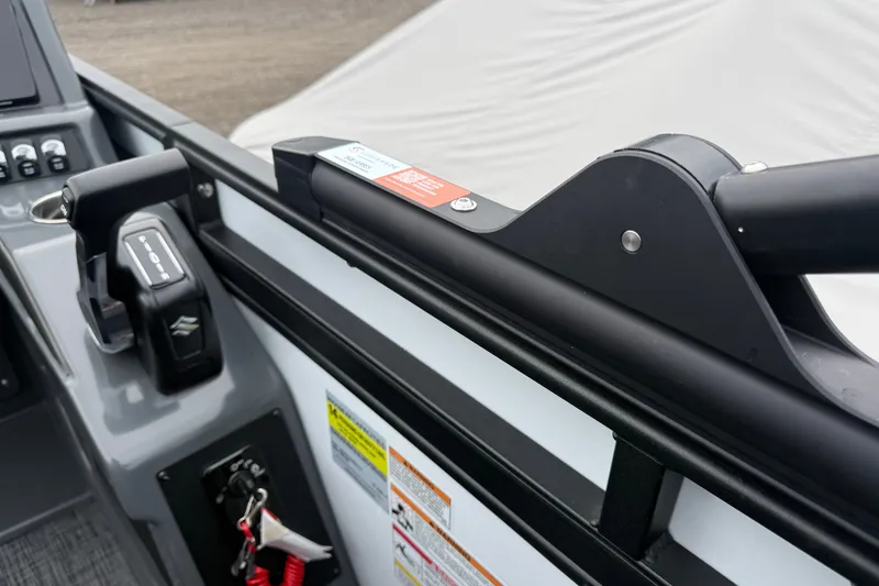 Slide: The Image of Control panel of Whisper VISION RLS 23V boat, featuring throttle and safety instructions. - 20