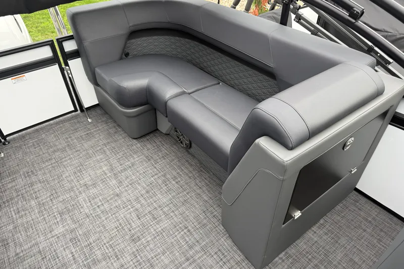 Slide: The Image of Luxurious seating on the 2027 Whisper VISION RLS 23V boat, featuring sleek gray upholstery. - 28