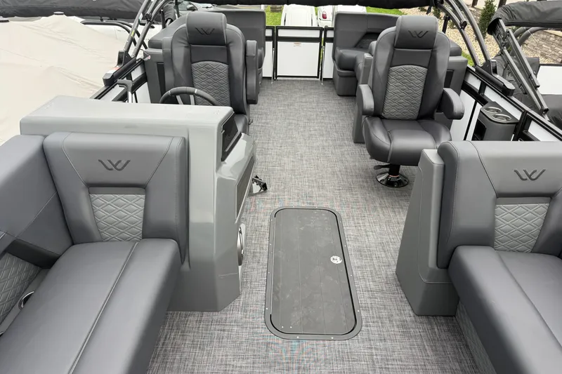 Slide: The Image of Luxurious interior of 2027 Whisper VISION RLS 23V boat with plush seating and modern design. - 16